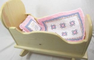 doll cradle with bedding 